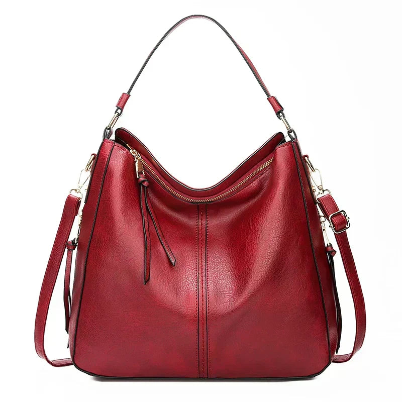 Romy | Sac à bandoulière en cuir