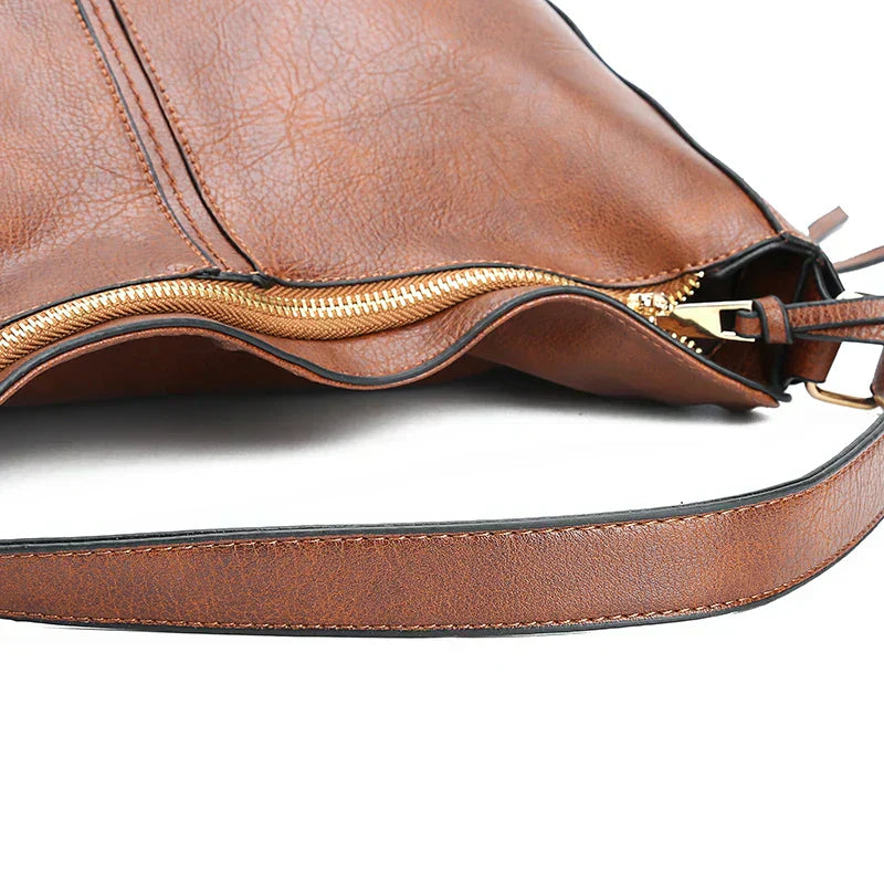 Romy | Sac à bandoulière en cuir